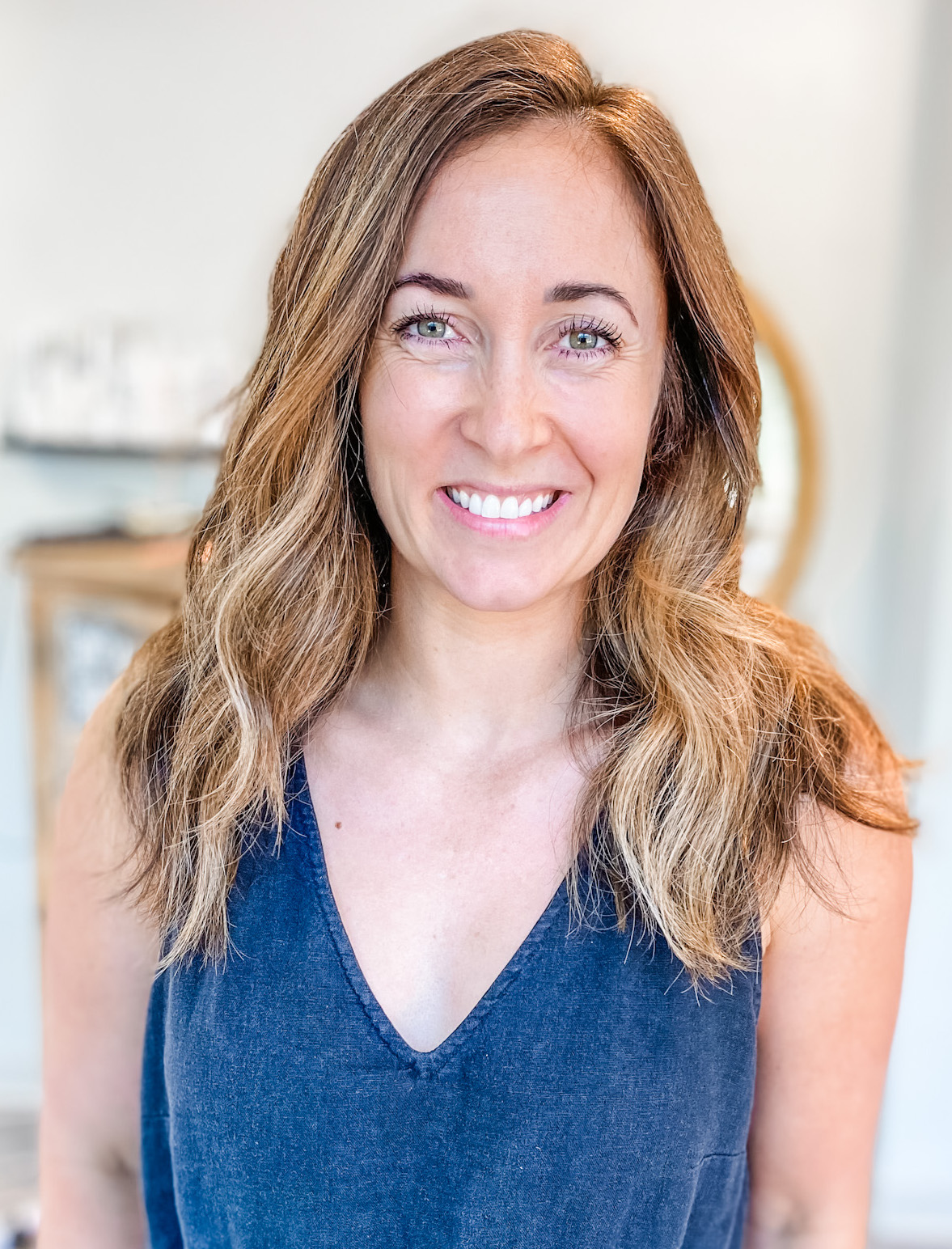 Caucasian adult woman smiling at the camera